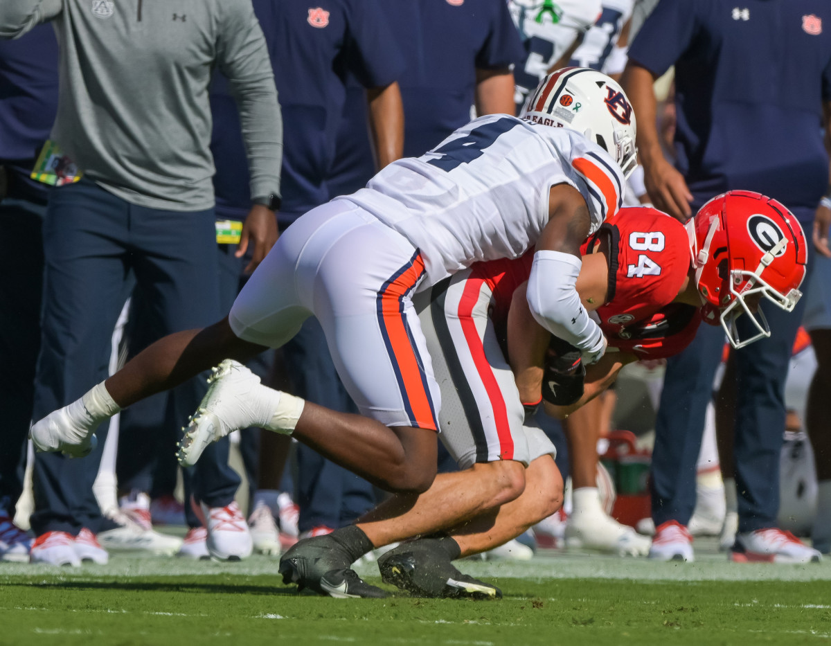DJ James tackles Ladd McConkey.
